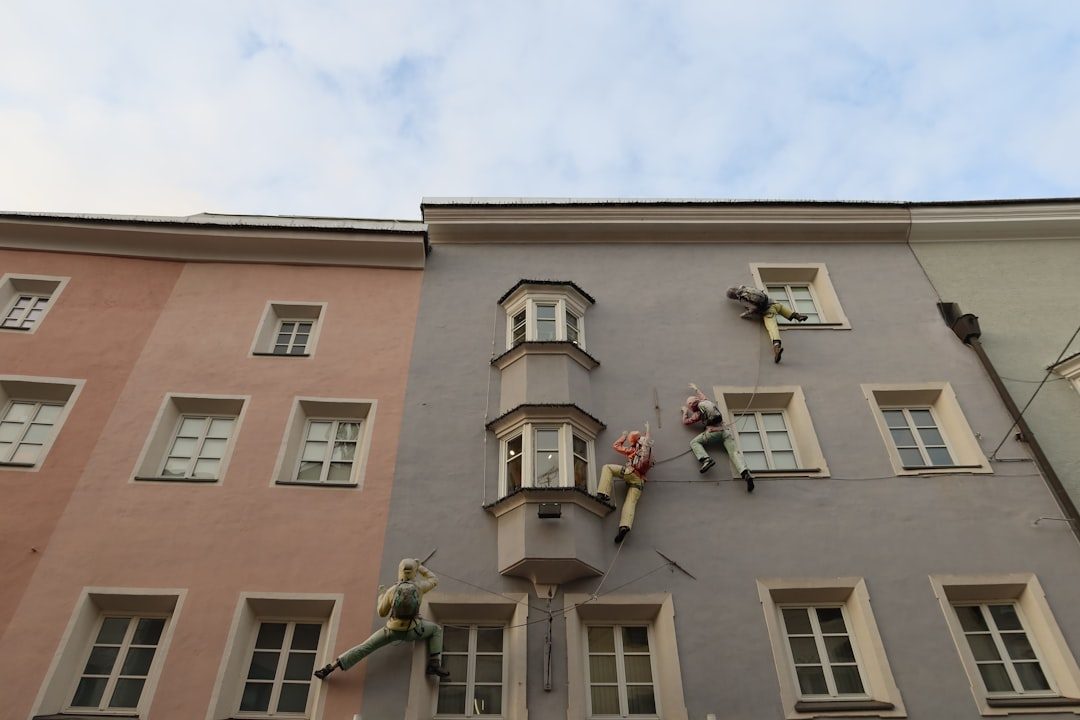 a tall building with a clock on the side of it